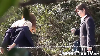 Japanese Schoolgirls Indulge In Naughty Peeing Outside While Holding Each Other